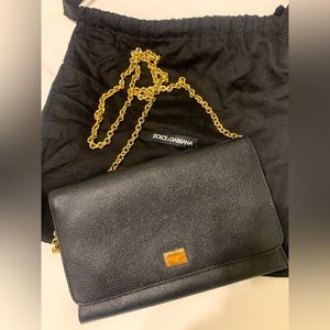 Dolce & Gabbana black leather clutch/cross body bag with gold chain strap